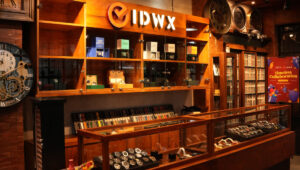 Interior of IDWX luxury watch store in Jakarta showcasing Rolex and other high-end watches