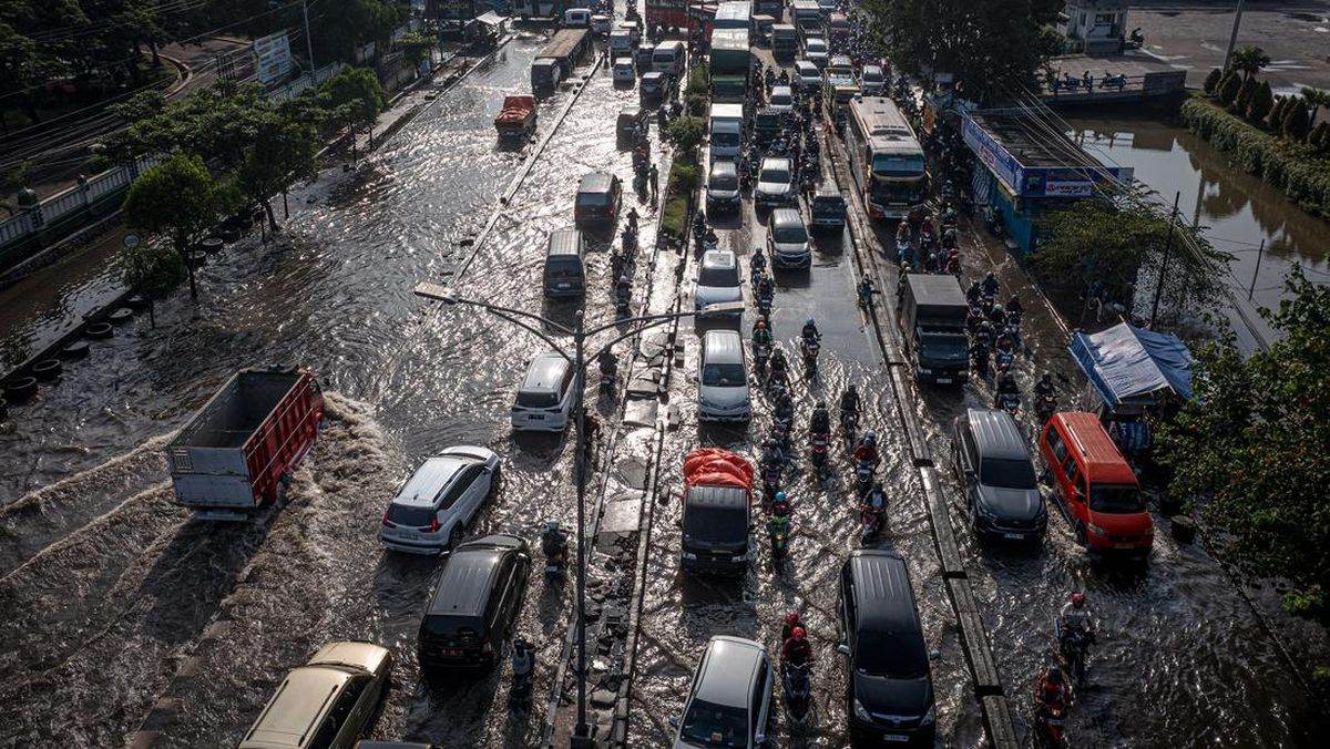 cuaca ekstrem, BMKG, hujan lebat, angin kencang, mudik Lebaran, banjir, tanah longsor, Berita terkini