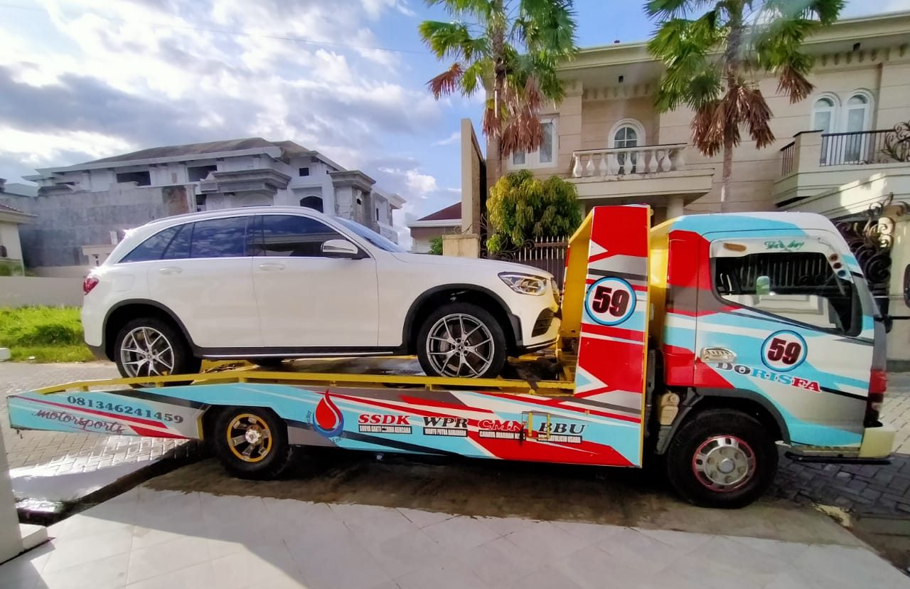 mobil derek sby, jasa derek surabaya, derek mobil 24 jam, layanan derek sby, towing surabaya, derek gendong, derek hidrolik, bengkel surabaya